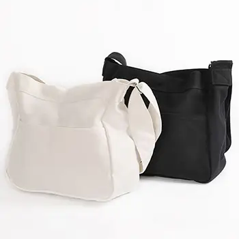 Minimalist Canvas Shoulder Bag with Spacious Compartments and Adjustable Strap