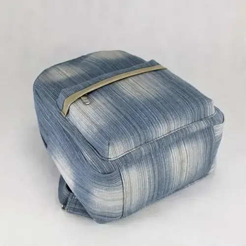  Compact Denim Backpack with Modern Style